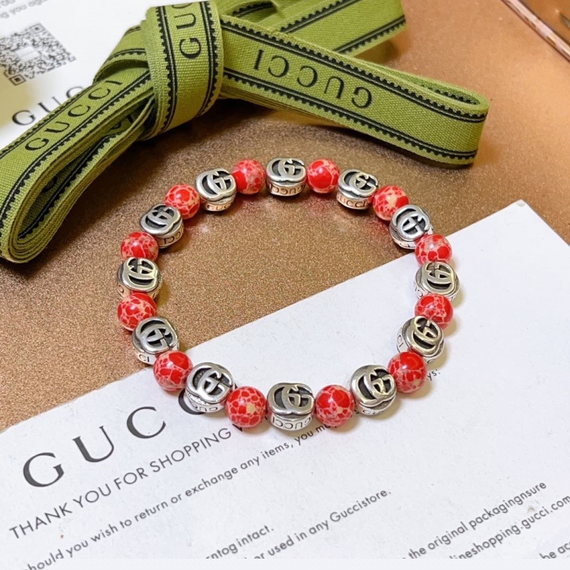G*u*i bracelets